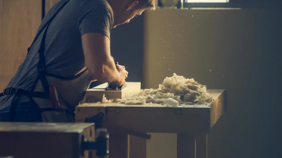 Craftsman working at a wooden bench
